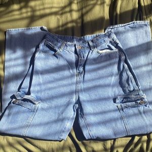 Baggy blue jeans with yellow stitching